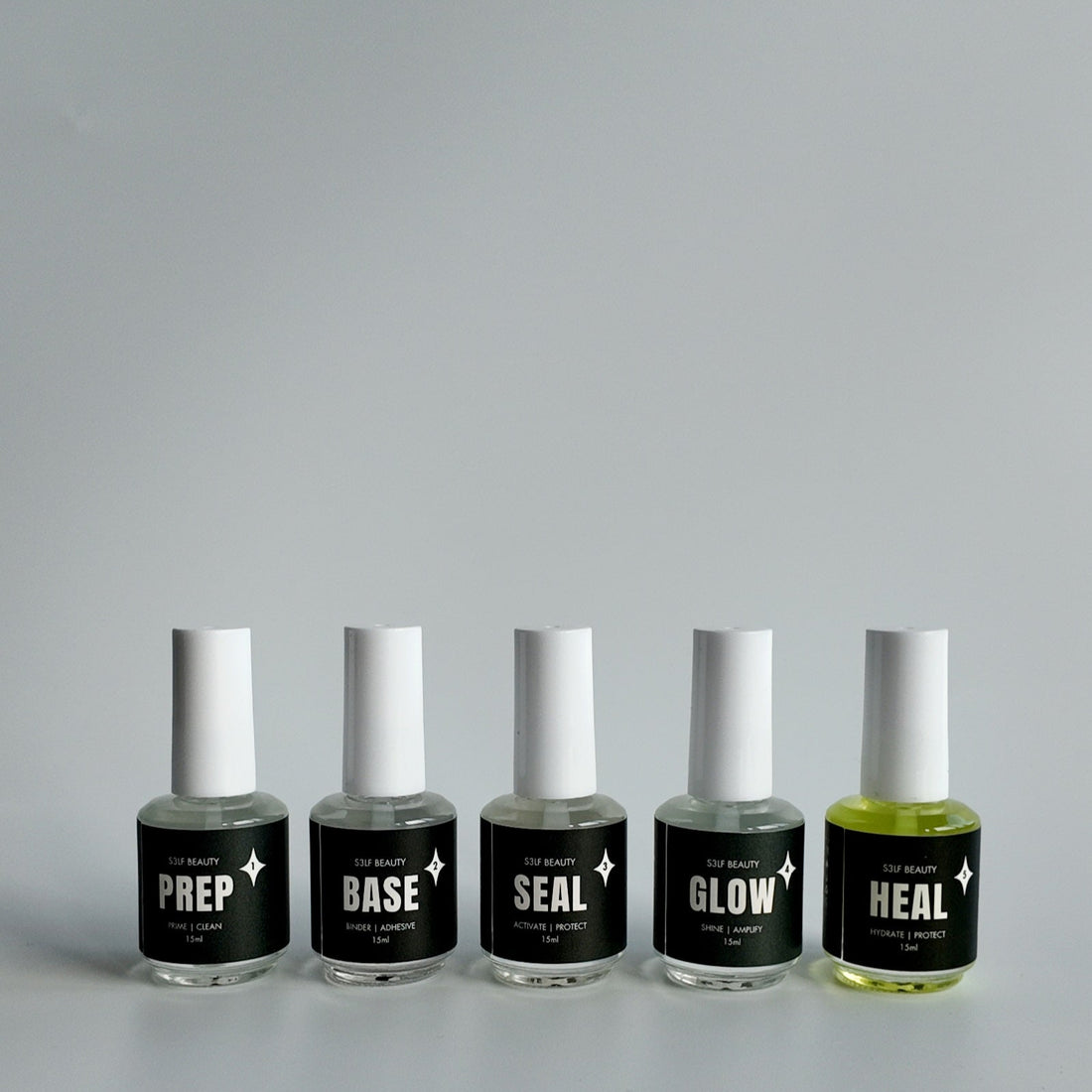 Five nail polish bottles labeled &