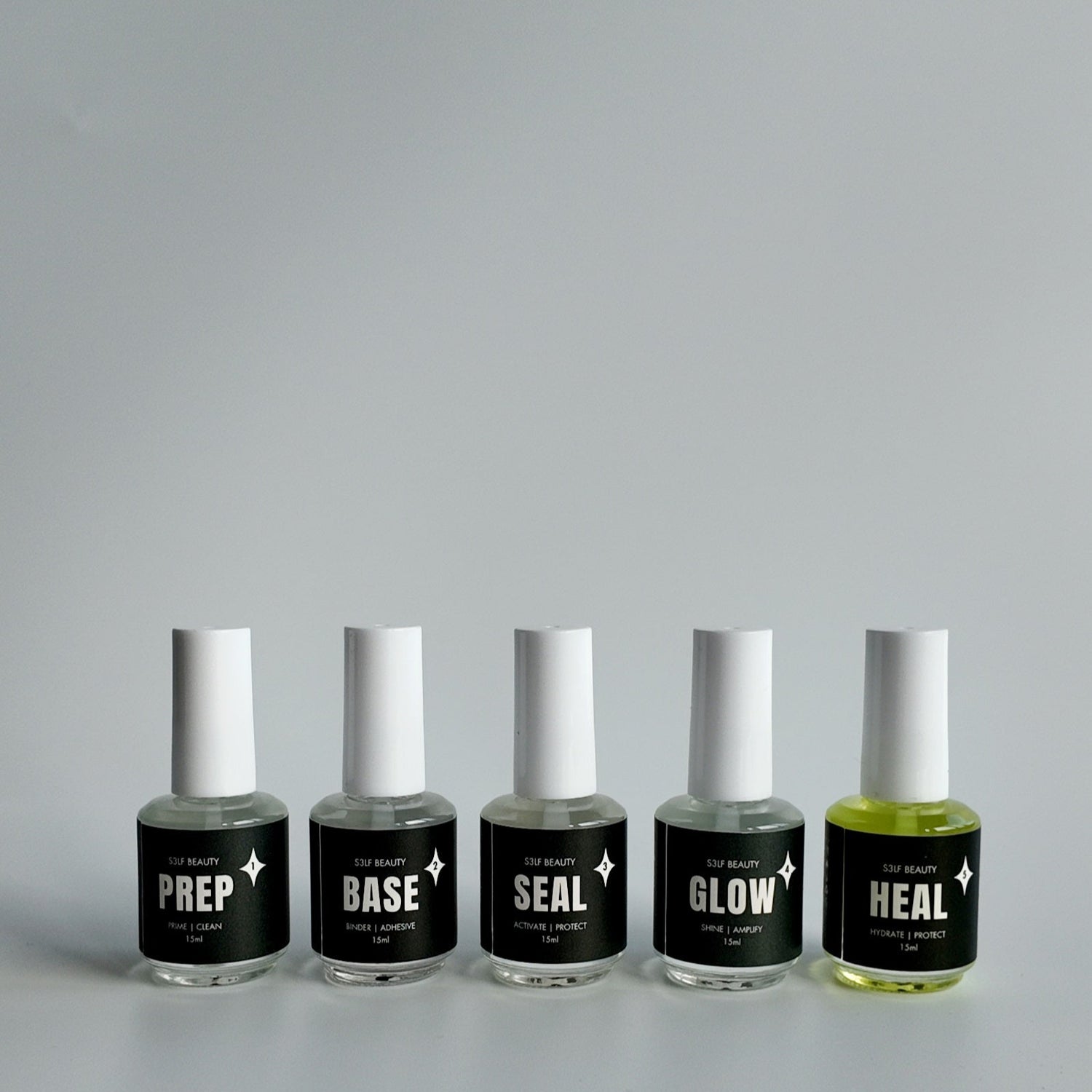 Five nail polish bottles labeled &